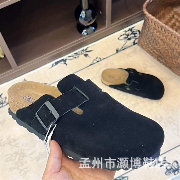 حذاء بيركنستوك الأسود من جلد المولبيري مع قاعدة فلين وكباسات معدنية مريحة وناعمة