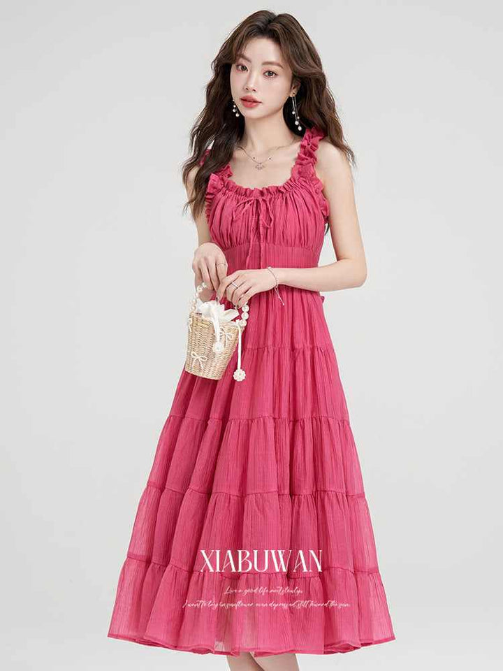women's summer seaside cake dress with suspenders and ruffled details