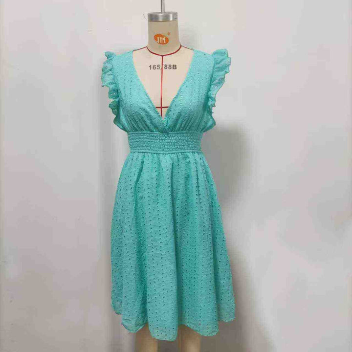 Elegant plus-size V-neck women's fashion dress with ruffle sleeves and cut-out design.