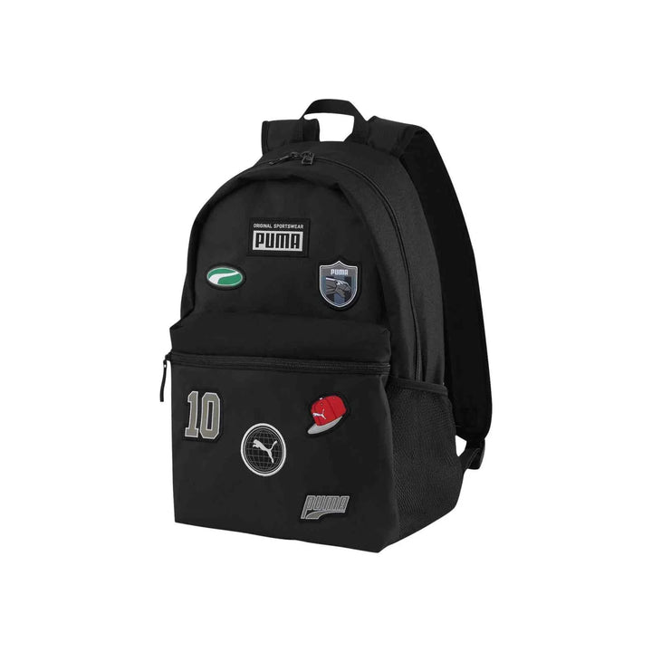 Black Puma backpack with multiple badges and sporty design, durable fabric and padded adjustable straps, suitable for school and casual use.