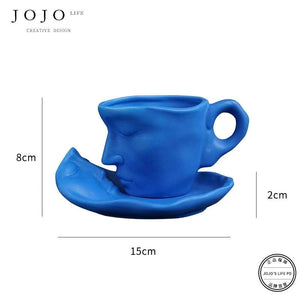 طقم كوب سيراميك Creative Design بتصميم وجه فني مميز.