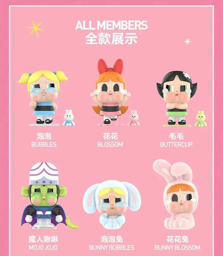 Colorful Crybaby dolls with various facial expressions from Pop Mart on a pink background.