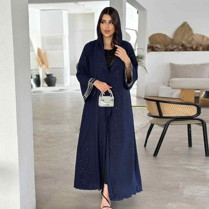 Elegant wide-cut abaya with traditional embroidery and subtle embellishments, featuring a hood and available in black, maroon, and navy blue.