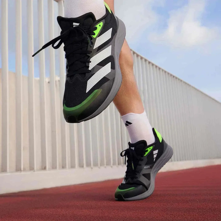 أديداس حذاء Adizero RC 4 أسود وأخضر للجري بخفة وزن وراحة عالية