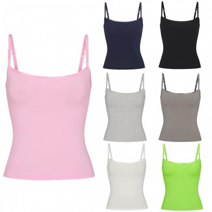 Collection of SKIMS essential cami tops with thin straps in multiple colors including pink, navy, black, gray, taupe, white, and lime green.