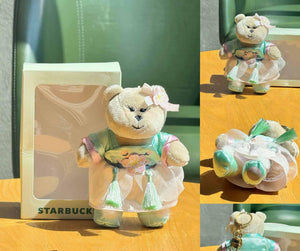 مجموعة Starbucks بنقوش الزهور ولون Pastel أخضر.