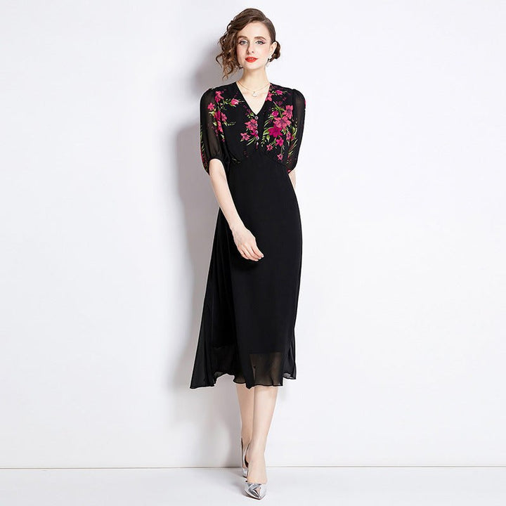 Elegant black chiffon dress with floral pattern and puff sleeves, high waist retro slim fit.