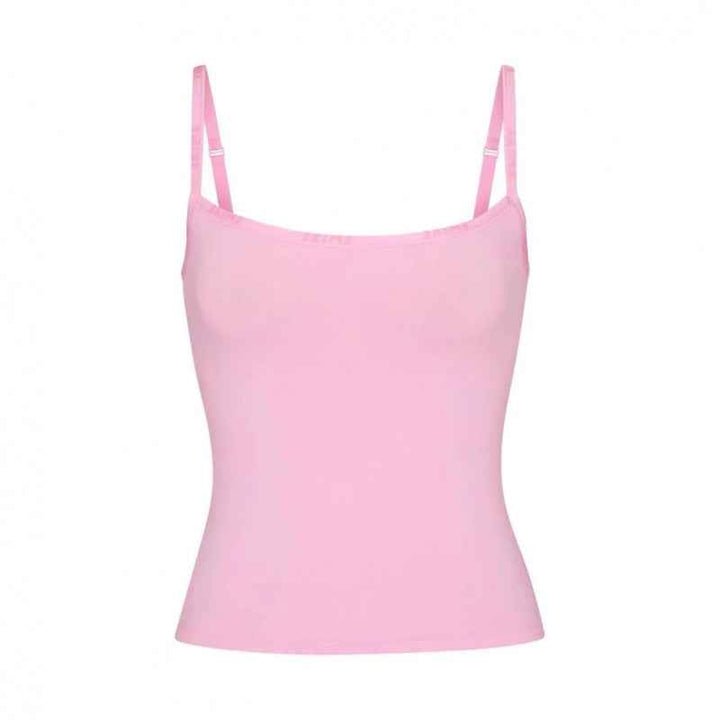 Pink SKIMS Essential Cami Top with thin adjustable straps and a straight cut design.