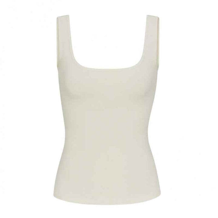 SKIMS essential square neck tank top in soft beige fabric with a sleek, comfortable fit