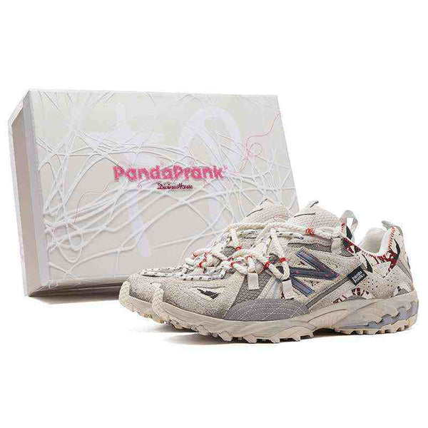 نيوبالانس Limited edition New Balance × PandaPrank sneakers with graffiti design and bold red accents, featuring durable materials and high-traction sole.