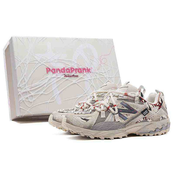 نيوبالانس Limited edition New Balance × PandaPrank sneakers with graffiti design and bold red accents, featuring durable materials and high-traction sole.