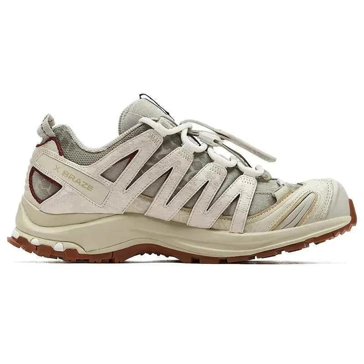Salomon XA Pro 3D sneaker in cream and beige with brown accents, limited edition inspired by Japanese craftsmanship, featuring Contagrip sole and Quicklace system.