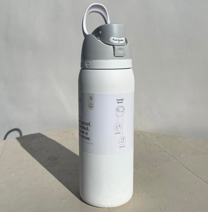 Owala FreeSip white leak-proof water bottle with dual spout for straw and direct drinking, 24-hour cold insulation, BPA-free