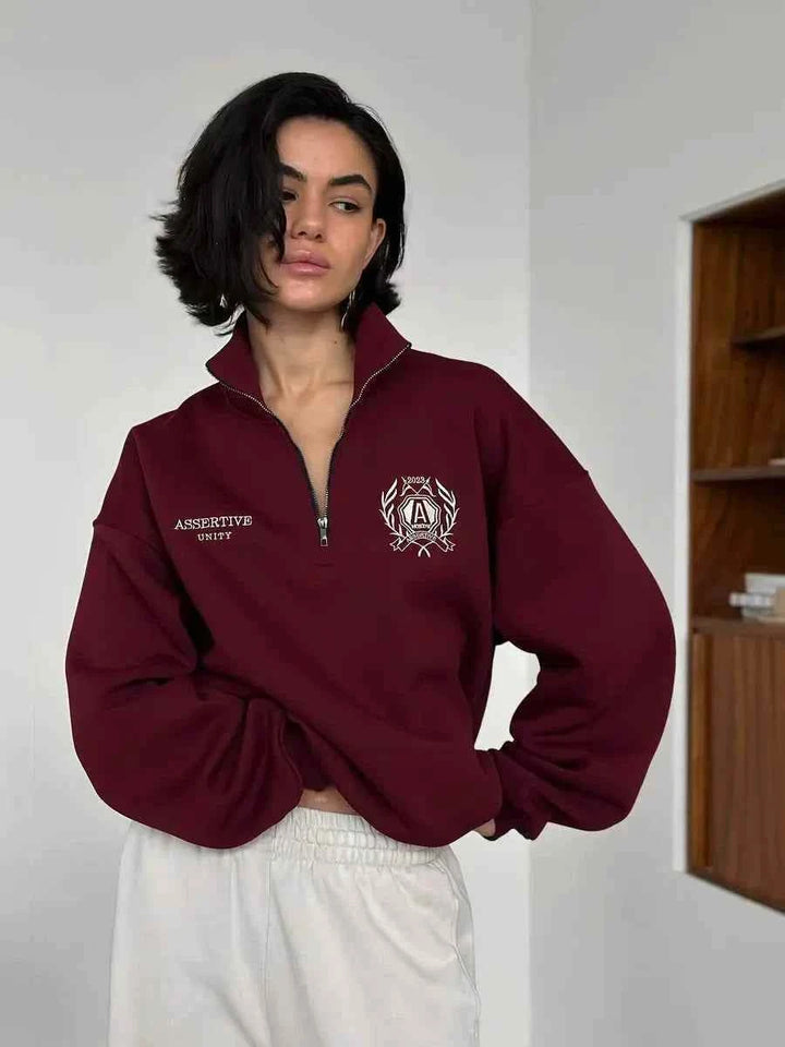 كنزة فضفاضة أوروبية وأمريكية جديدة برقبة مطبعة ونصف سحاب لون عنابي