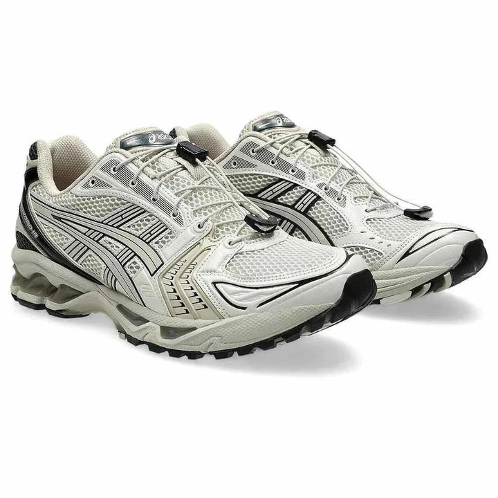 Asics حذاء سنيكرز لممارسة رياضة الجري Gel-Kayano 14 باللون الرمادي الدخاني بنعل مطاطي ونظام أربطة سريع.