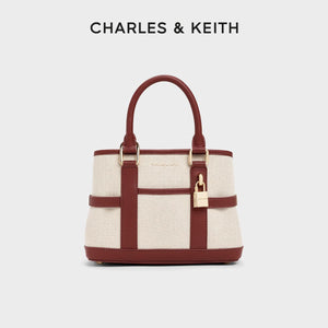 حقيبة يد CHARLES & KEITH بتصميم القفل الأنيق.