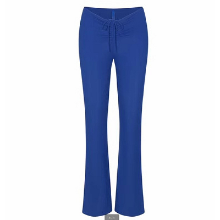 SKIMS wide leg lounge pants in blue with adjustable waistband and soft stretchy fabric for comfort and casual wear