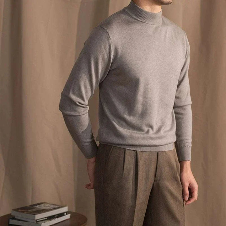 Mr. Lu San's 30% wool half-high neck slim fit sweater in soft gray with ribbed cuffs and hem