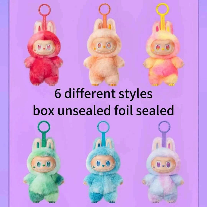 Pop Mart THE MONSTERS Front High Energy Series plush characters in colorful rabbit costumes.