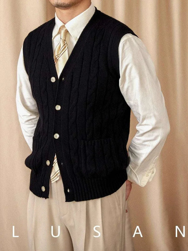 Mr. Lu San's wool cardigan vest black cable knit with pearl buttons and front pockets for men