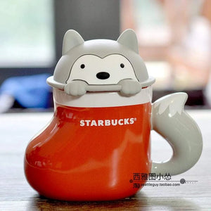 كوب Starbucks سيراميك بتصميم ثعلب باللون البرتقالي.