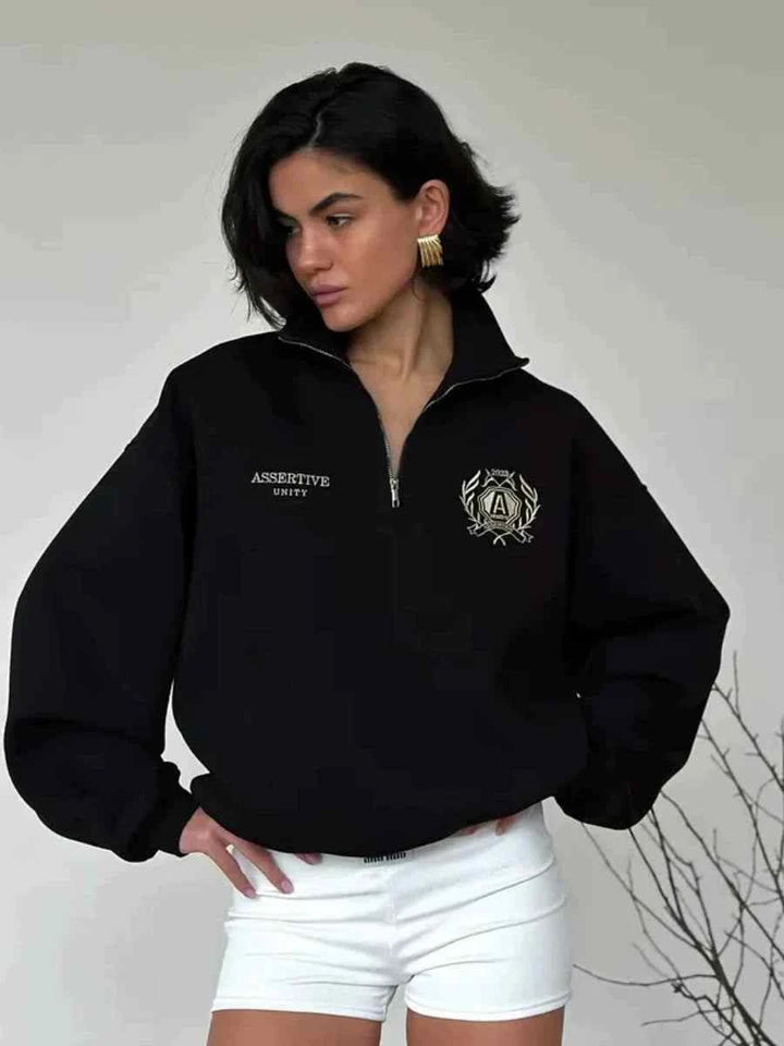 كنزة رياضية سوداء بأكمام واسعة وسحاب نصف علوي بتصميم أوروبي وأمريكي جديد