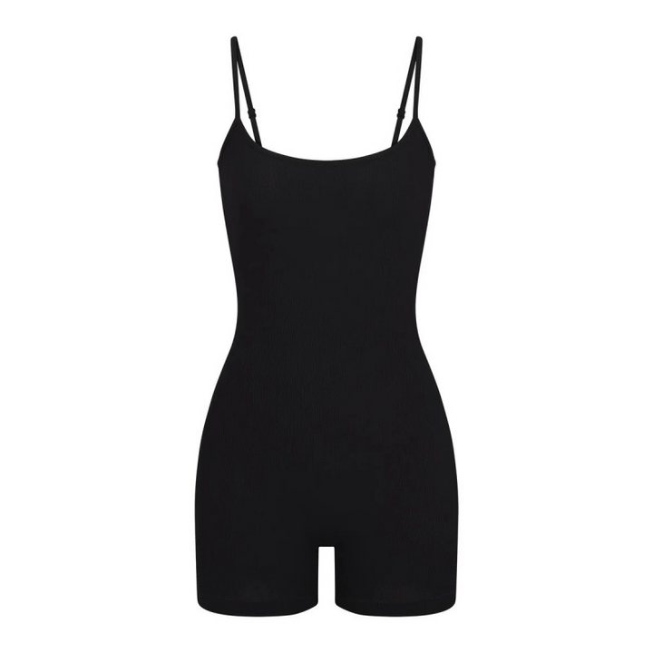Black SKIMS short romper with thin straps, comfortable and stretchy fabric for casual or stylish wear.