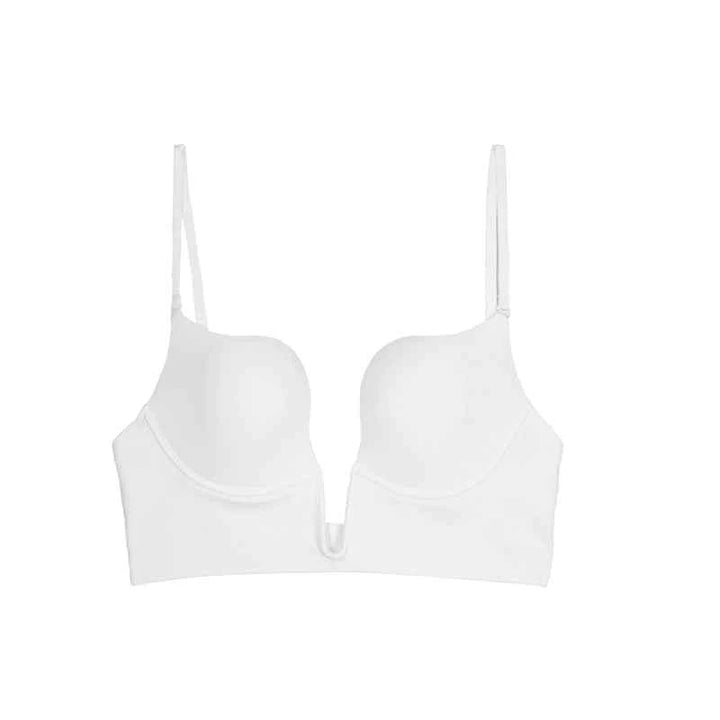 White seamless SKIMS Kardashian deep V bra for summer with adjustable straps and breathable fabric.