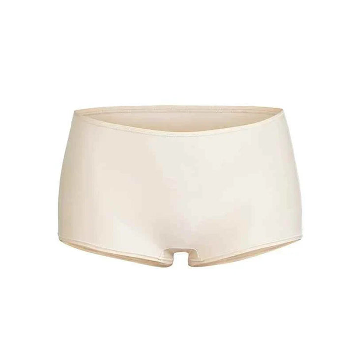Pāk Lu SKIMS seamless high stretch women's boy short panties in beige, soft nylon-spandex blend, comfortable fit under tight clothing