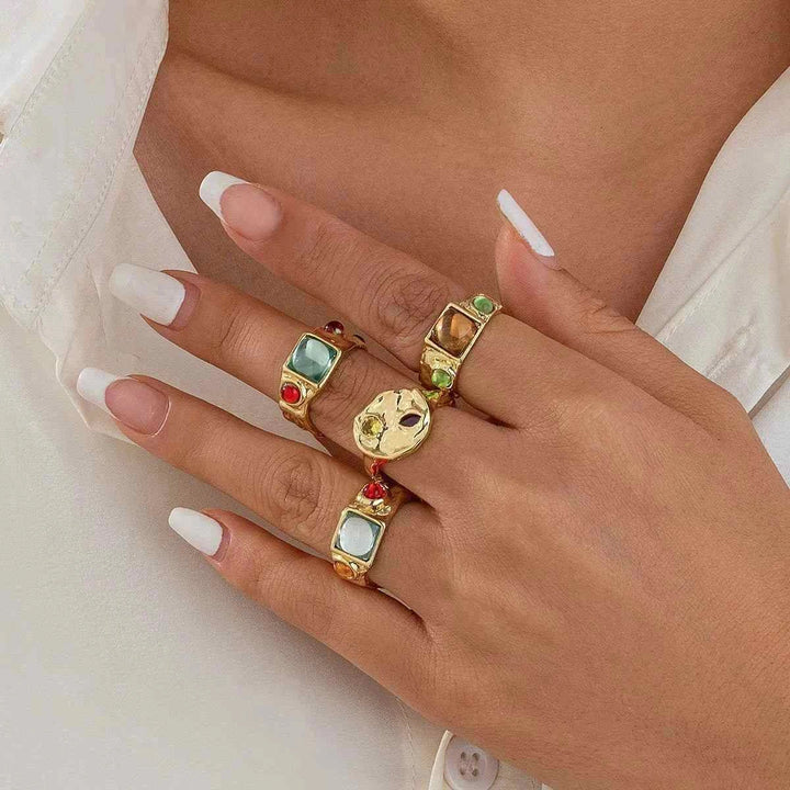 طقم خواتم نسائي بتصميم هندسي مع أحجار liquid metal glossy ring كريمة ولمسة معدنية لامعة بأسلوب Irregular Pattern أوروبي وأمريكي عصري 2025