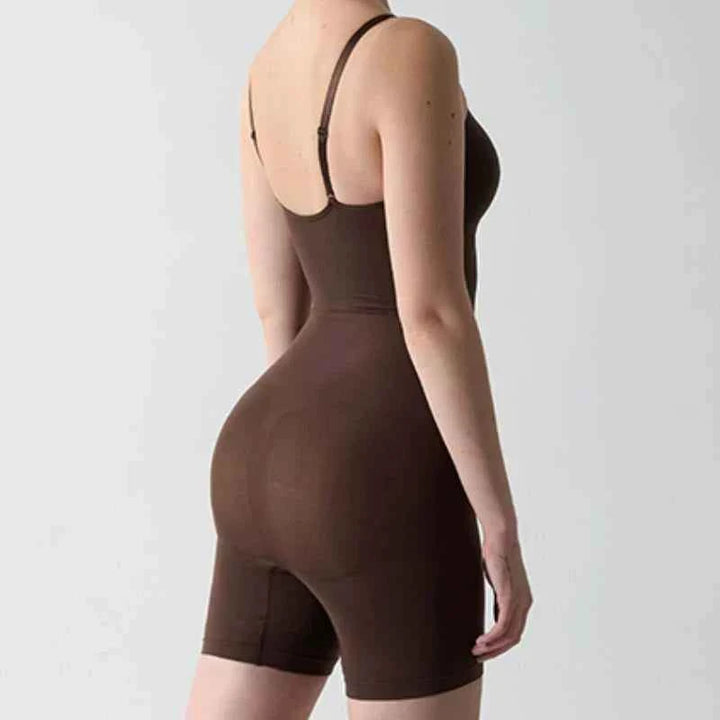 woman wearing brown seamless soft shaping bodysuit with adjustable straps, body contouring fit from chest to thighs