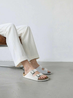 BIRKENSTOCK  Arizona double-buckle slippers.