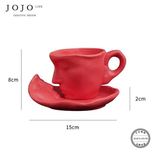طقم كوب سيراميك Creative Design بتصميم وجه فني مميز.