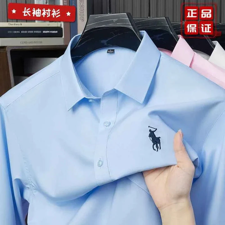 Blue polo shirt for high school youth with embroidered logo, available in multiple colors and sizes, casual formal style.