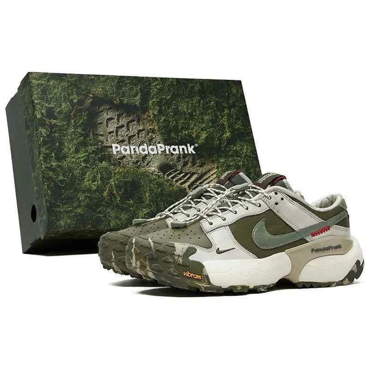 Nike × PandaPrank Pro Trekking System rugged outdoor hiking shoes with Vibram sole and Quicklace system next to branded green camo box