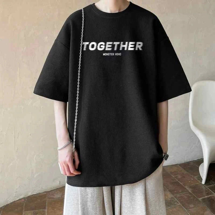 Black MORRYING T-shirt with cartoon character print and relaxed fit for casual wear
