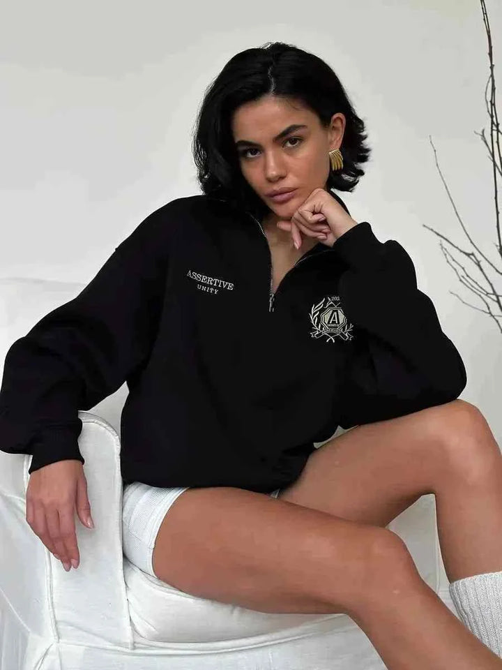 بلوزة فضفاضة بطبعة وأكمام طويلة وياقة مطوية بنصف سحاب بتصميم أوروبي وأمريكي جديدة