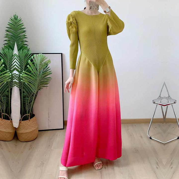 Elegant long-sleeve gradient dress with pleated design and puffed shoulders.