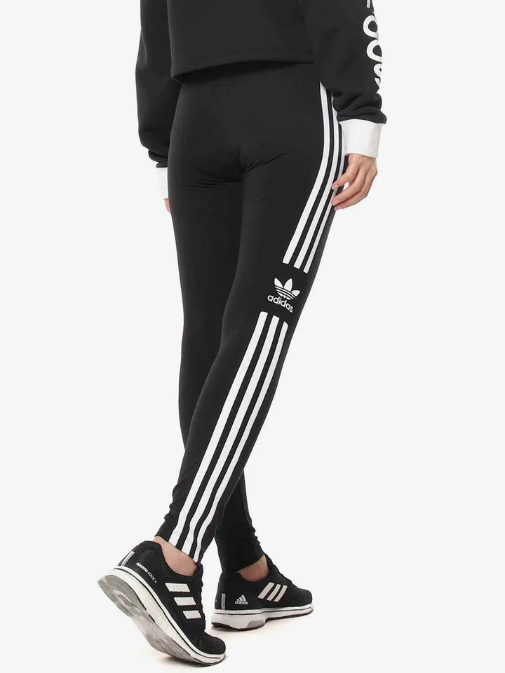 Black Adidas leggings with three classic white stripes and logo, slim fit and stretchy fabric for comfort and style.