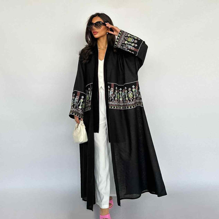 Elegant Middle Eastern embroidered robe with traditional motifs, wide design, perfect for events and everyday wear.