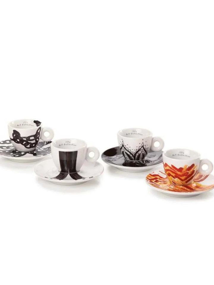 مجموعة فناجين إسبريسو illy 2024 بفن البورسلان المزخرف بألوان سوداء وحمراء وبرتقالية بتصاميم فنية راقية