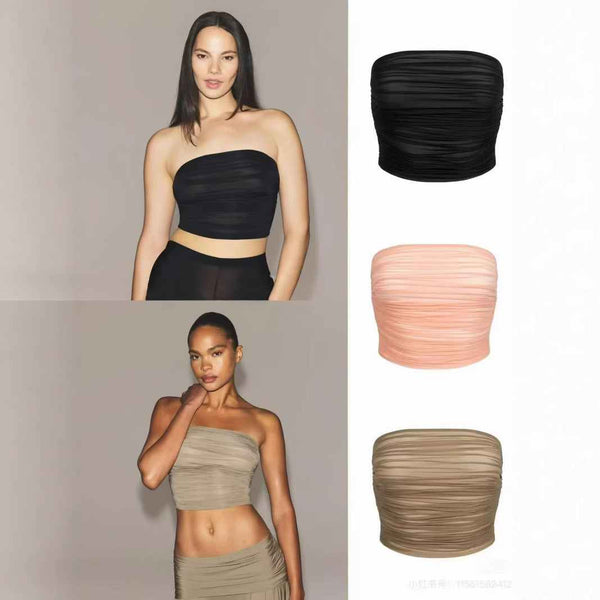 SKIMS ruched bandeau crop tops in black, beige, and peach worn by models and displayed flat