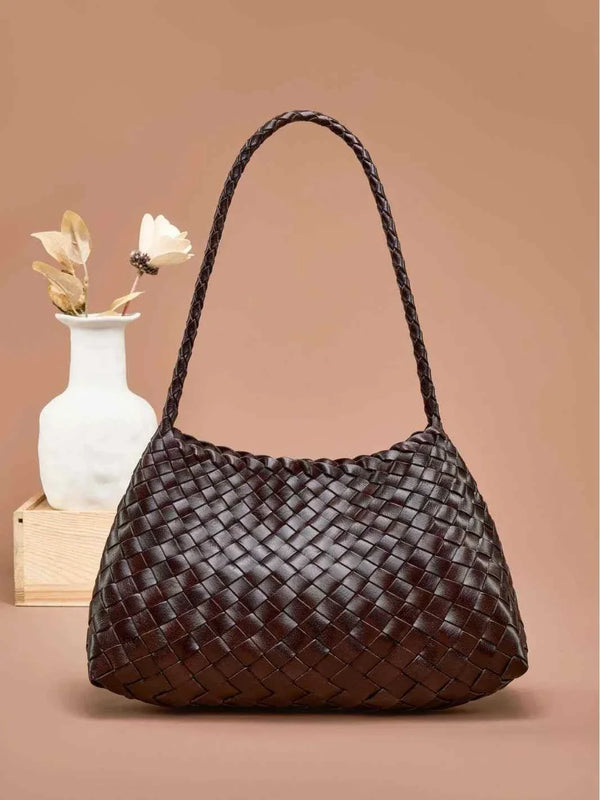 dark brown dragon woven bag made of braided natural cow leather with a single shoulder strap