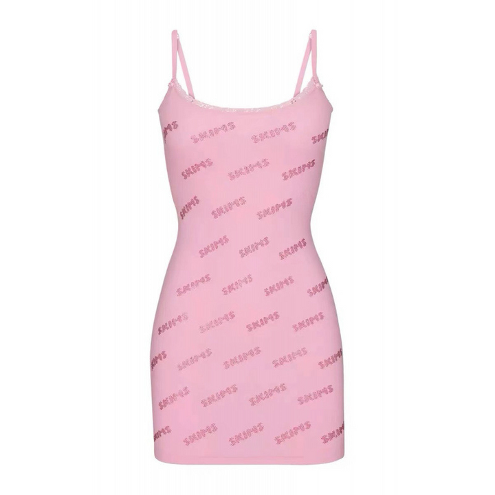 Pink Skims short dress with thin straps and logo print, comfortable and stylish design.