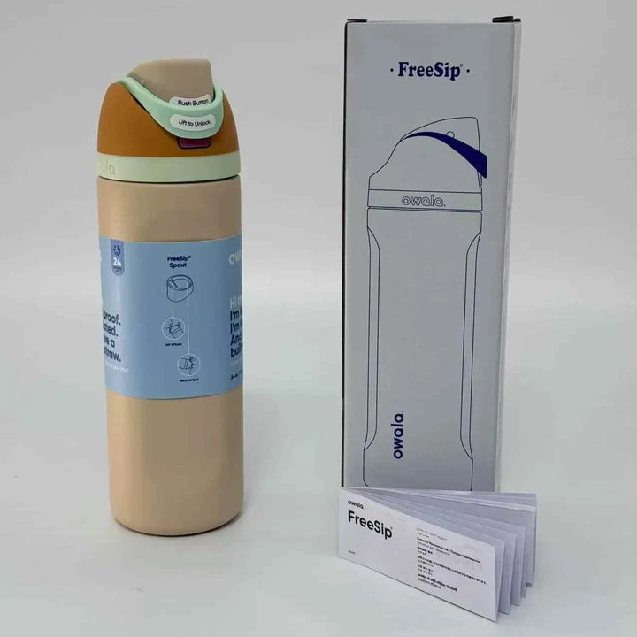 Owala FreeSip stainless steel water bottle with dual drinking spout, leak-proof design, and 24-hour beverage cooling with packaging and manual