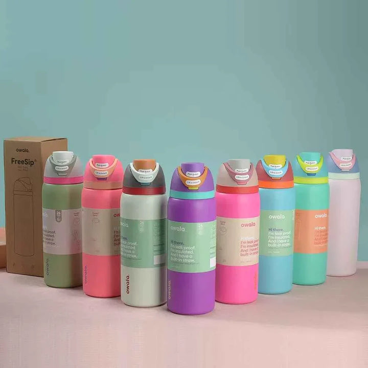 Set of colorful Owala FreeSip stainless steel water bottles with smart dual-spout design and leak-proof caps