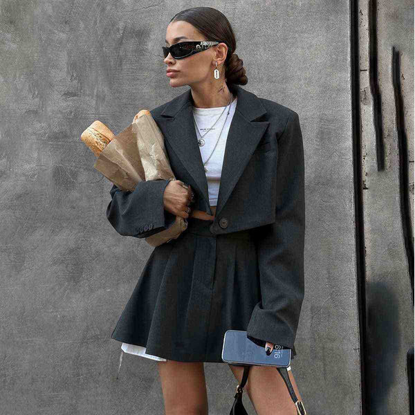 Y2K style suit skirt with shoulder lapel small blazer and mini skirt, 2025 spring summer fashion.