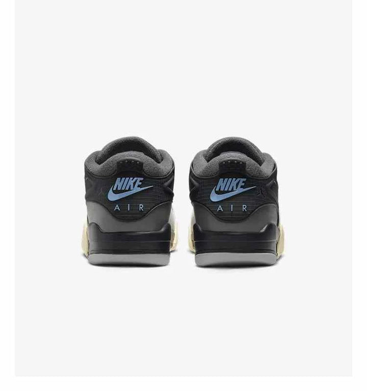Back view of Air Jordan 4RM in Iron Gray and Chambray with Nike Air logo.