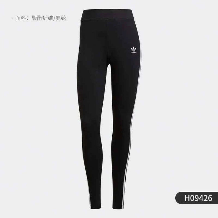 Adidas black leggings with white side stripes and original logo, comfortable stretchy fit for sports and casual wear