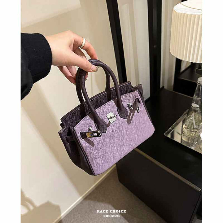 Racechoice Platinum Bag in premium purple cowhide, color-blocked mini tote for women 2025.